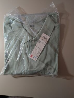 Uniqlo Men's Light Sage Green Polo Shirt